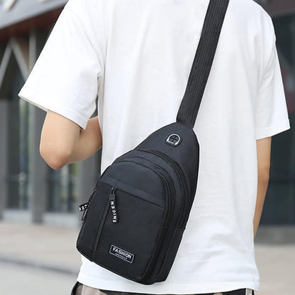 Aura Restored Gideon Collection sling bag with USB port, crossbody style, lightweight chest bag for women and men, accessories.