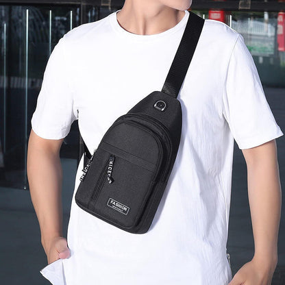 Aura Restored Gideon Collection sling bag with USB port, crossbody design, versatile chest bag for women and men.