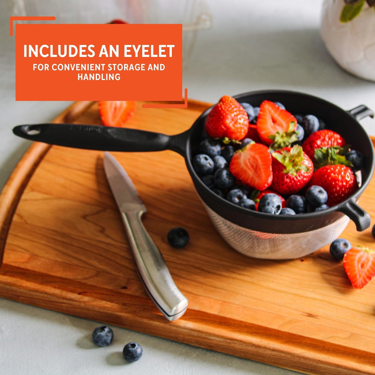 Black 6-inch plastic kitchen strainer by Aura Restored, ideal for cooking and draining in the kitchen.